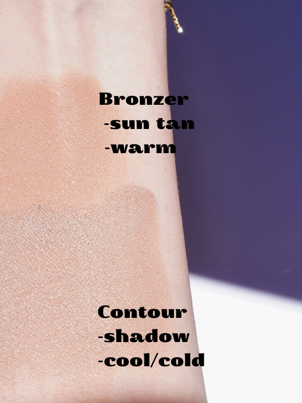 swatching on the hand a contour cool shade and a bronzer warm shade